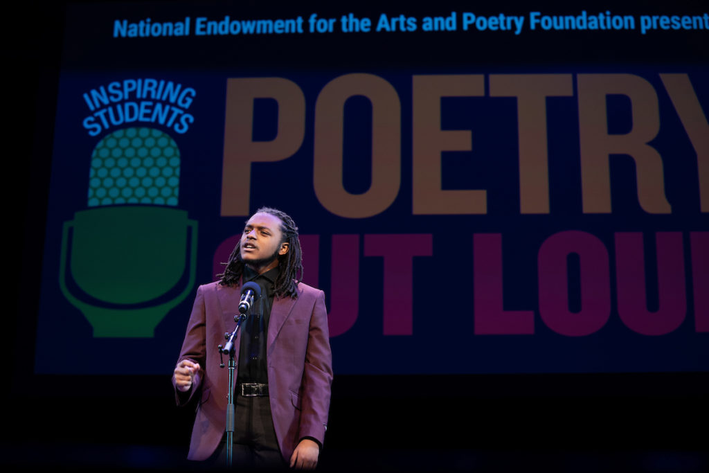 Photo of Florida Champion Zhaedyn Hodge Sigars performing at Poetry Out Loud, Howard W. Blake HS © James Kegley ([from the Poetry Out Loud Photo Gallery](https://www.poetryoutloud.org/about-poetry-out-loud/photo-galleries/)).